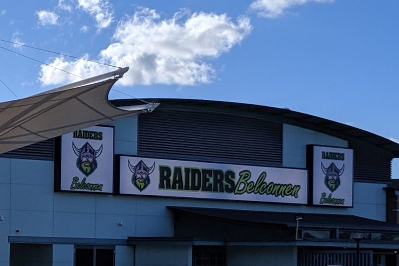 The front of Raiders Belconnen, with its Raiders Belconnen signs under a blue sky